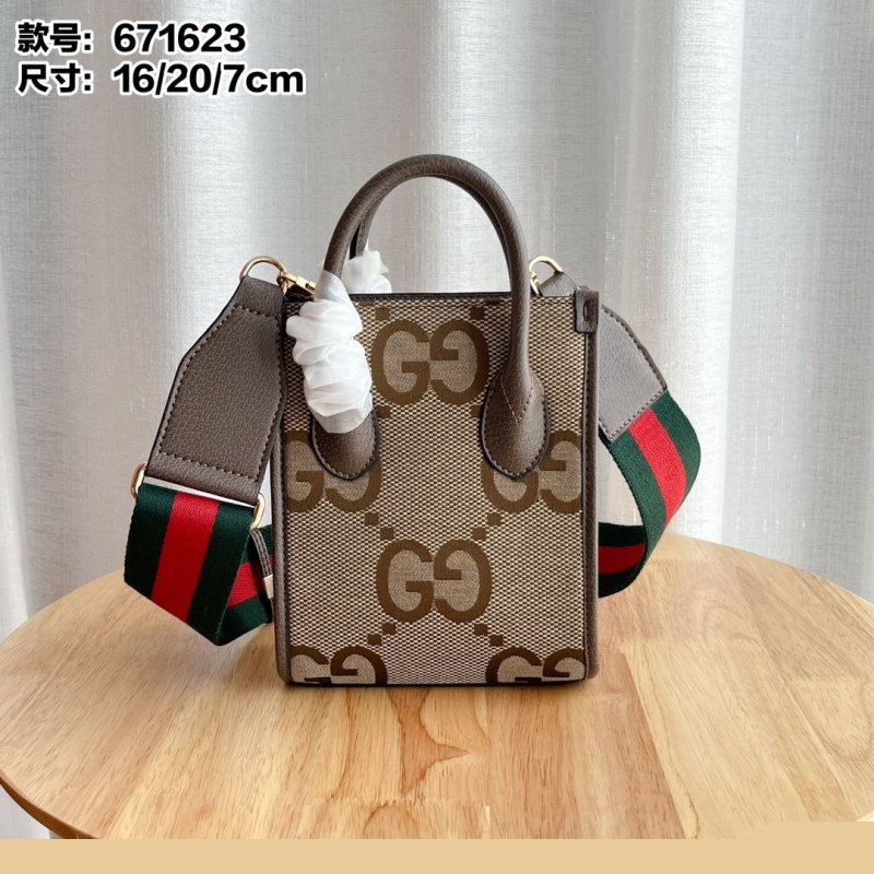 G*u*i top handle bags